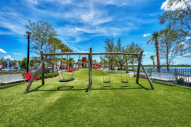 20636 Swallowtail Ct, Venice, FL 34293 - community play area featuring a water view