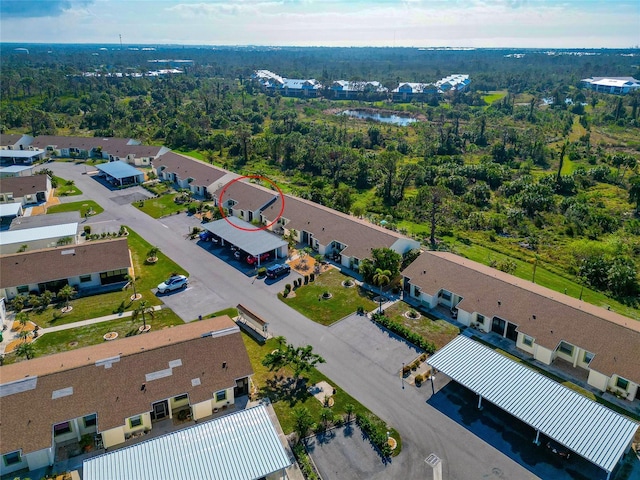 6796 Gasparilla Pines Blvd Unit 18, Englewood, FL 34224 - aerial view of property's location featuring nearby suburban area and a heavily wooded area