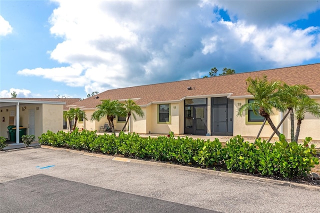 6796 Gasparilla Pines Blvd Unit 18, Englewood, FL 34224 - view of front of property with stucco siding