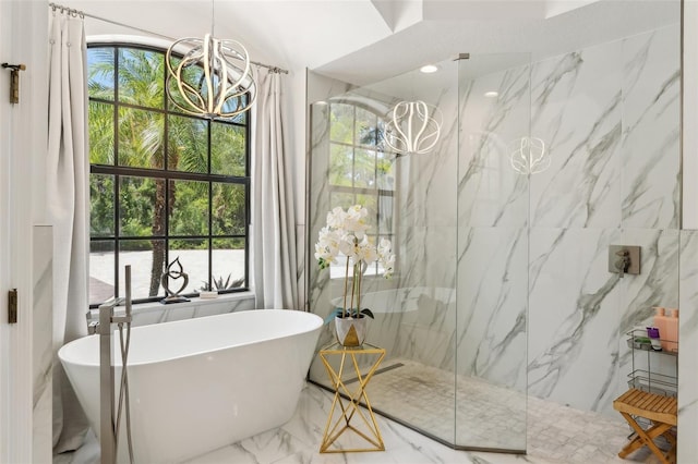 5850 Saddle Oak Trl, Sarasota, FL 34241 - bathroom featuring a chandelier, a marble finish shower, marble finish floors, and a freestanding bath