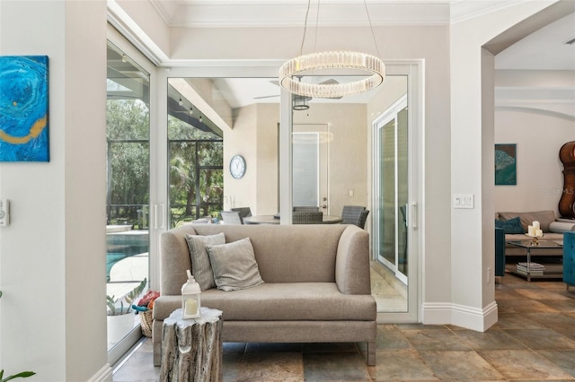 5850 Saddle Oak Trl, Sarasota, FL 34241 - sitting room with plenty of natural light, baseboards, stone finish floors, and ornamental molding