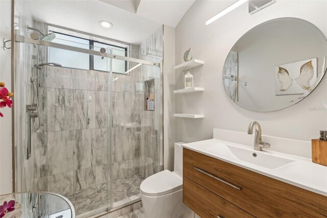 5850 Saddle Oak Trl, Sarasota, FL 34241 - bathroom with toilet, vanity, and a shower stall