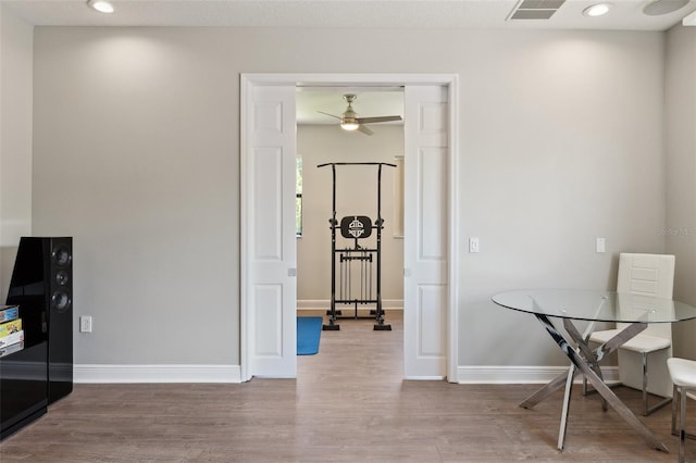 5850 Saddle Oak Trl, Sarasota, FL 34241 - office area with wood finished floors, baseboards, ceiling fan, and recessed lighting