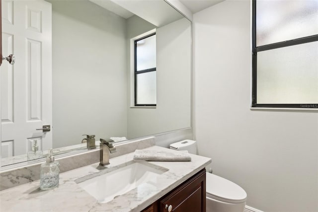 5850 Saddle Oak Trl, Sarasota, FL 34241 - half bath with toilet, vanity, and baseboards