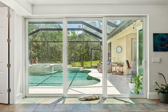 5850 Saddle Oak Trl, Sarasota, FL 34241 - doorway to outside with baseboards, stone finish flooring, and ornamental molding