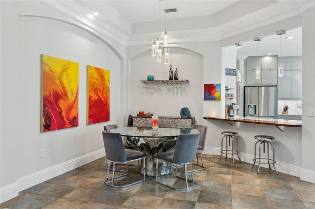 5850 Saddle Oak Trl, Sarasota, FL 34241 - dining room featuring stone finish floors and baseboards