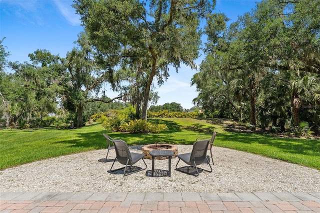 5850 Saddle Oak Trl, Sarasota, FL 34241 - view of patio / terrace featuring a fire pit