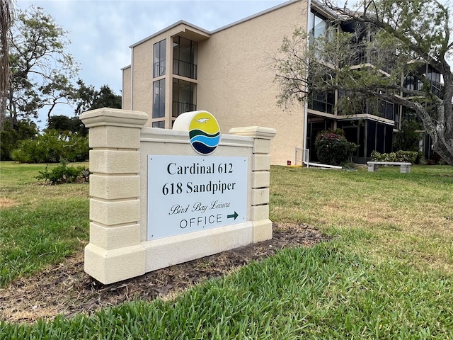 612 Bird Bay Dr S Unit 308, Venice, FL 34285 - community sign with a lawn
