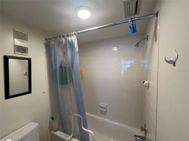 612 Bird Bay Dr S Unit 308, Venice, FL 34285 - bathroom with toilet and shower / tub combo with curtain