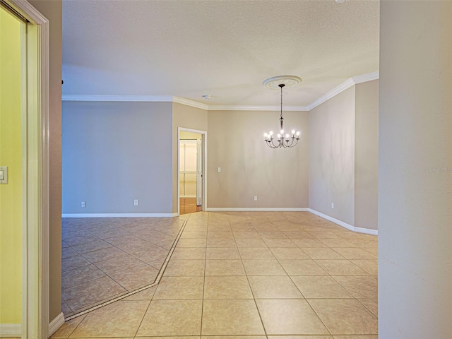 912 Barclay Ct, Venice, FL 34293 - spare room featuring a chandelier, ornamental molding, baseboards, light tile patterned flooring, and a textured ceiling