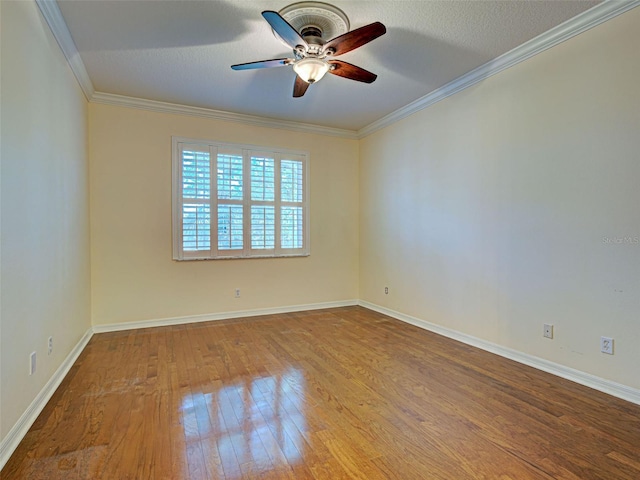 912 Barclay Ct, Venice, FL 34293 - spare room with hardwood / wood-style flooring, ceiling fan, ornamental molding, and baseboards