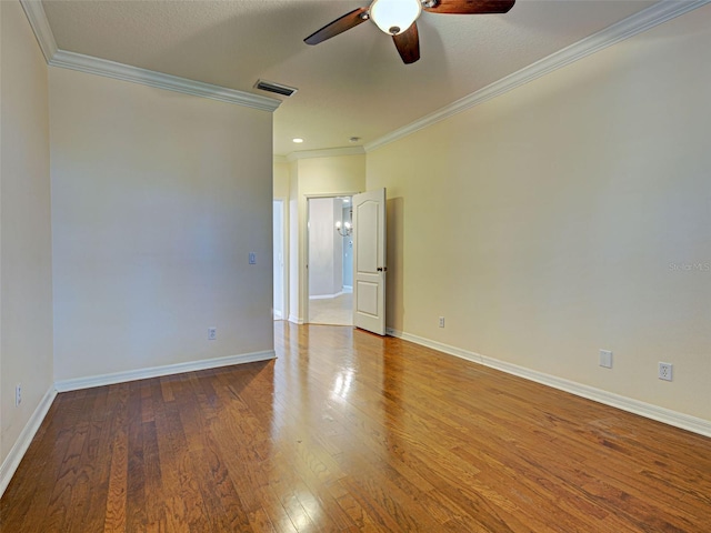912 Barclay Ct, Venice, FL 34293 - empty room featuring ceiling fan, ornamental molding, wood finished floors, and baseboards