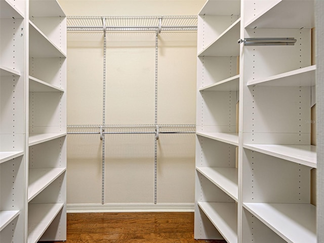 912 Barclay Ct, Venice, FL 34293 - spacious closet with wood finished floors