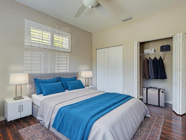 912 Barclay Ct, Venice, FL 34293 - bedroom with two closets, wood finished floors, baseboards, and a ceiling fan