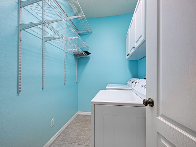 912 Barclay Ct, Venice, FL 34293 - laundry room with cabinet space, washing machine and dryer, and baseboards