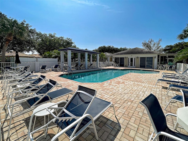 912 Barclay Ct, Venice, FL 34293 - community pool featuring a gazebo and a patio area