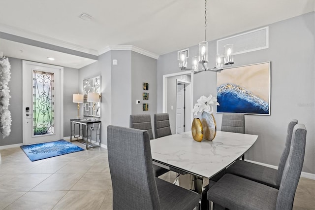 10808 Tarflower Dr Unit 102, Venice, FL 34293 - dining space with a chandelier, baseboards, ornamental molding, and light tile patterned floors