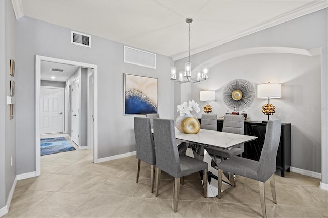 10808 Tarflower Dr Unit 102, Venice, FL 34293 - dining room with a chandelier, baseboards, and ornamental molding