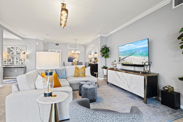 10808 Tarflower Dr Unit 102, Venice, FL 34293 - living room featuring crown molding, a chandelier, and baseboards