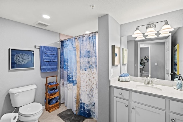 10808 Tarflower Dr Unit 102, Venice, FL 34293 - bathroom with toilet, vanity, a shower with curtain, and tile patterned flooring