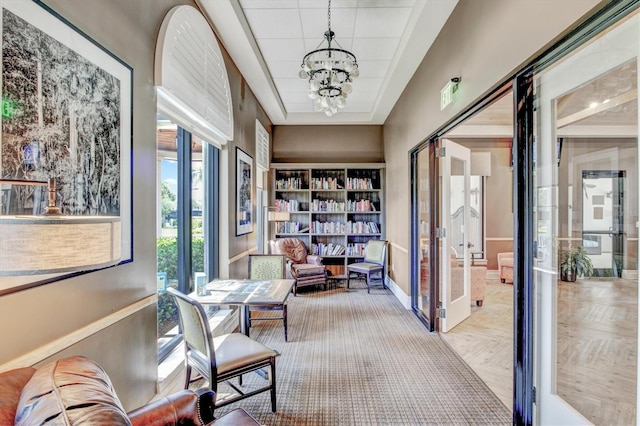 10808 Tarflower Dr Unit 102, Venice, FL 34293 - office space with a chandelier and baseboards