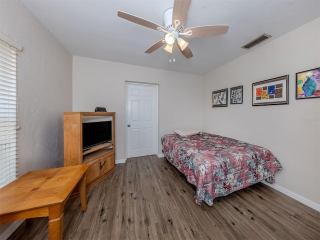 4192 Tarpon Rd, Venice, FL 34293 - bedroom featuring wood finished floors, baseboards, and ceiling fan