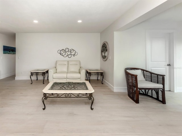 832 Whitecap Cir Unit 5, Venice, FL 34285 - sitting room featuring baseboards, light wood-type flooring, and recessed lighting