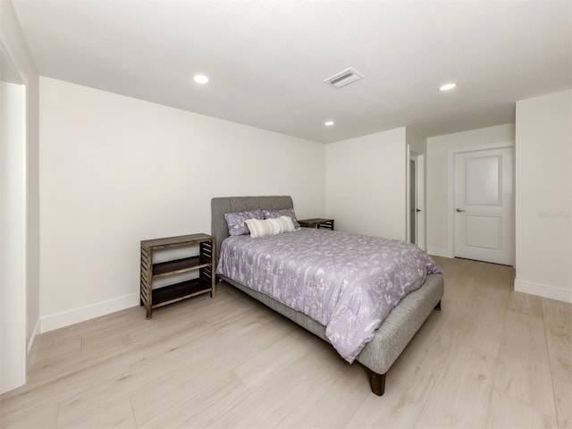 832 Whitecap Cir Unit 5, Venice, FL 34285 - bedroom featuring light wood-style flooring, baseboards, and recessed lighting