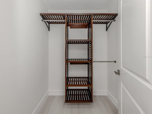832 Whitecap Cir Unit 5, Venice, FL 34285 - spacious closet with wood finished floors