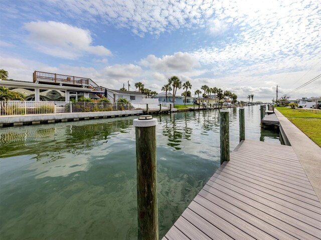 832 Whitecap Cir Unit 5, Venice, FL 34285 - dock area featuring a water view
