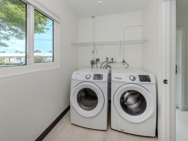 832 Whitecap Cir Unit 5, Venice, FL 34285 - washroom with washer and clothes dryer