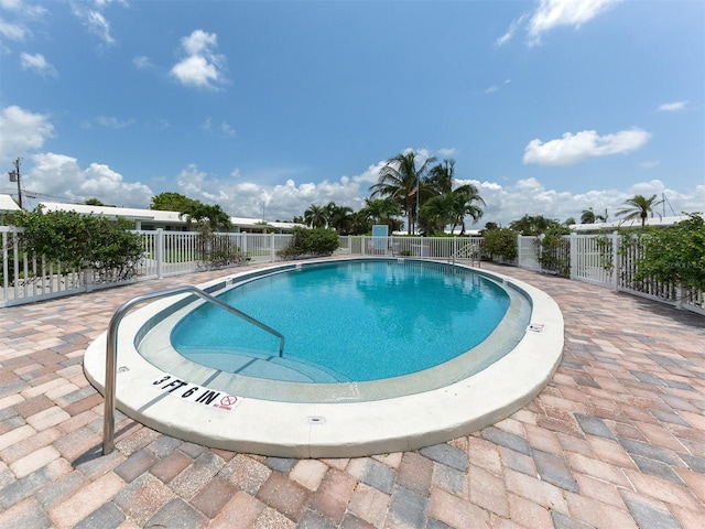 832 Whitecap Cir Unit 5, Venice, FL 34285 - community pool featuring fence and a patio