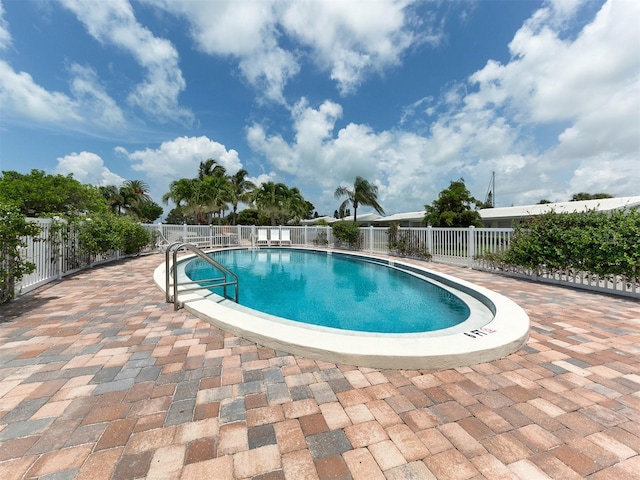 832 Whitecap Cir Unit 5, Venice, FL 34285 - community pool with fence and a patio