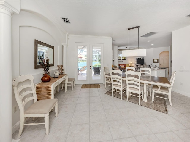 463 Park Trace Blvd, Osprey, FL 34229 - dining area featuring french doors, light tile patterned flooring, ornamental molding, and baseboards