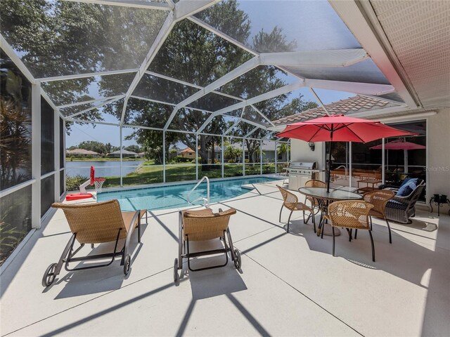 463 Park Trace Blvd, Osprey, FL 34229 - outdoor pool featuring a patio area, a water view, a grill, and glass enclosure