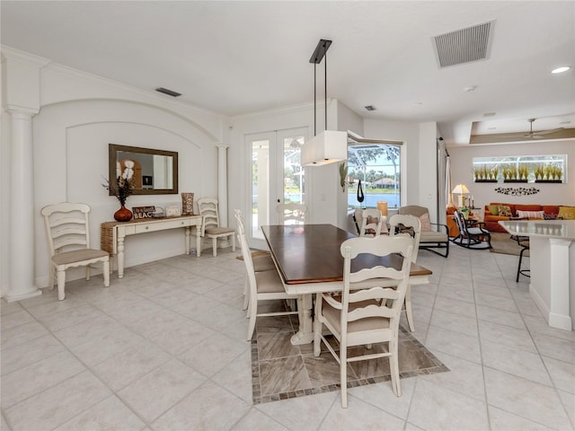 463 Park Trace Blvd, Osprey, FL 34229 - dining room with light tile patterned floors and crown molding