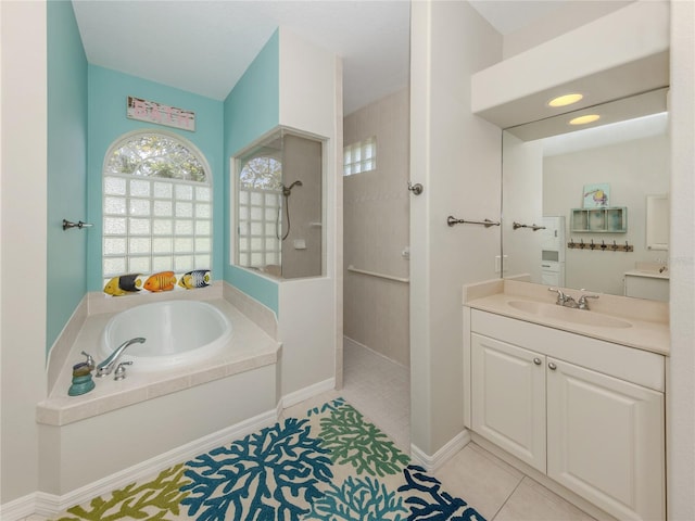 463 Park Trace Blvd, Osprey, FL 34229 - full bath featuring walk in shower, tile patterned flooring, a garden tub, and vanity