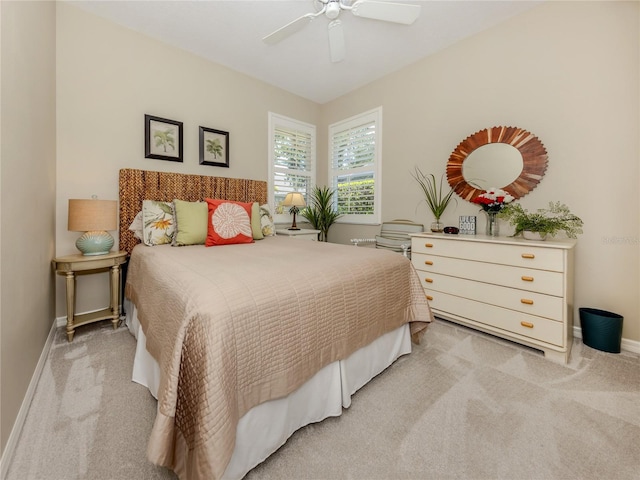 463 Park Trace Blvd, Osprey, FL 34229 - bedroom featuring light carpet, baseboards, and a ceiling fan