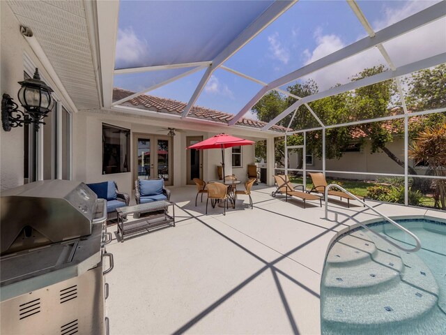 463 Park Trace Blvd, Osprey, FL 34229 - outdoor pool with french doors, a patio area, and a lanai
