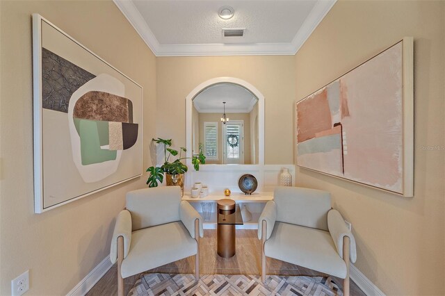 9220 43rd Ter W, Bradenton, FL 34209 - living area featuring ornamental molding and baseboards