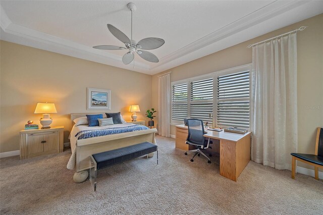 9220 43rd Ter W, Bradenton, FL 34209 - bedroom featuring light carpet, a desk, a raised ceiling, and ceiling fan
