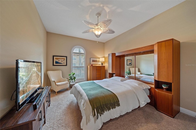 9220 43rd Ter W, Bradenton, FL 34209 - carpeted bedroom featuring a ceiling fan and baseboards
