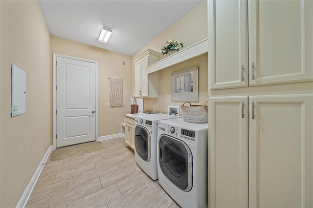 9220 43rd Ter W, Bradenton, FL 34209 - laundry room featuring washer and clothes dryer, cabinet space, electric panel, and baseboards