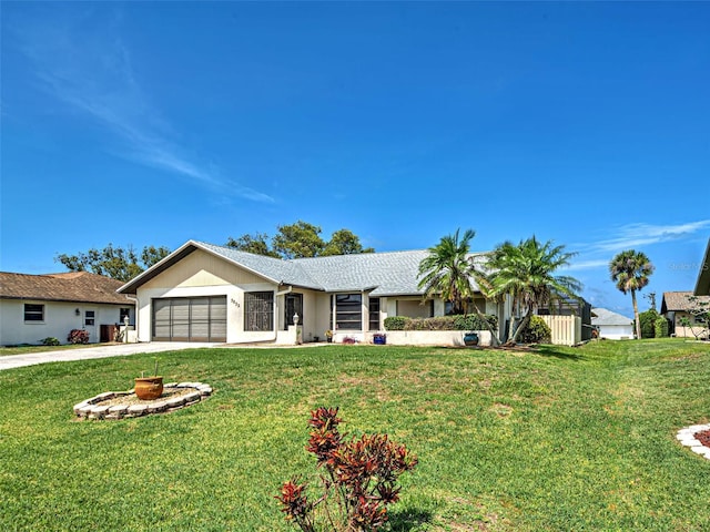 5832 Monroe Rd, Venice, FL 34293 - single story home featuring an attached garage, concrete driveway, and a front lawn