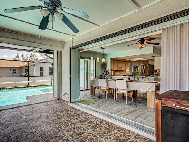 5832 Monroe Rd, Venice, FL 34293 - sunroom / solarium featuring a ceiling fan