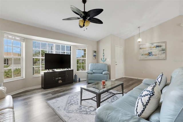 25509 Arequipa Dr, Punta Gorda, FL 33983 - living area featuring lofted ceiling, wood finished floors, baseboards, and a ceiling fan