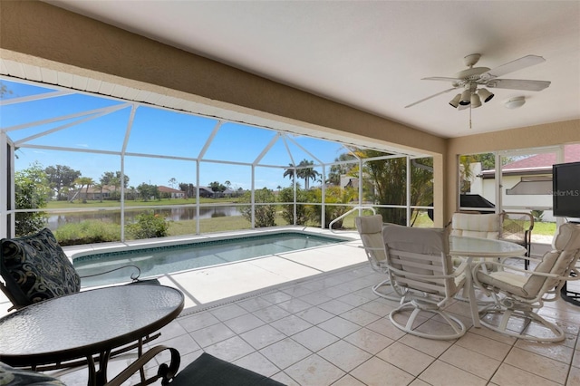 25509 Arequipa Dr, Punta Gorda, FL 33983 - outdoor pool featuring a patio area, ceiling fan, glass enclosure, and outdoor dining area