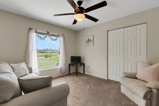 25509 Arequipa Dr, Punta Gorda, FL 33983 - carpeted living area with a ceiling fan and baseboards