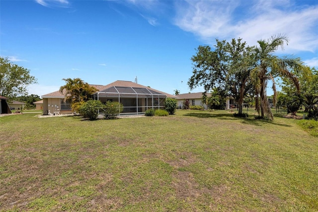 25509 Arequipa Dr, Punta Gorda, FL 33983 - view of green lawn with a lanai