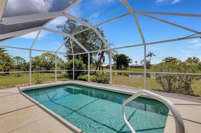 25509 Arequipa Dr, Punta Gorda, FL 33983 - swimming pool with a water view, a yard, glass enclosure, and a patio